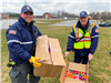 Walker Fire Department distributing eggs in park