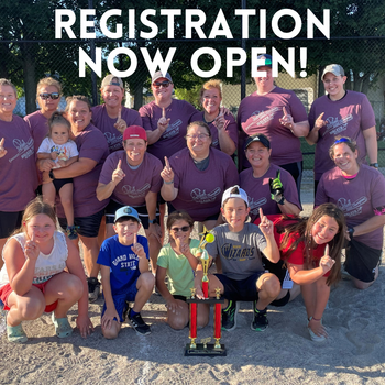 Group of women softball champions posing with their trophy