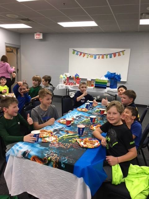 Kids at a pizza party